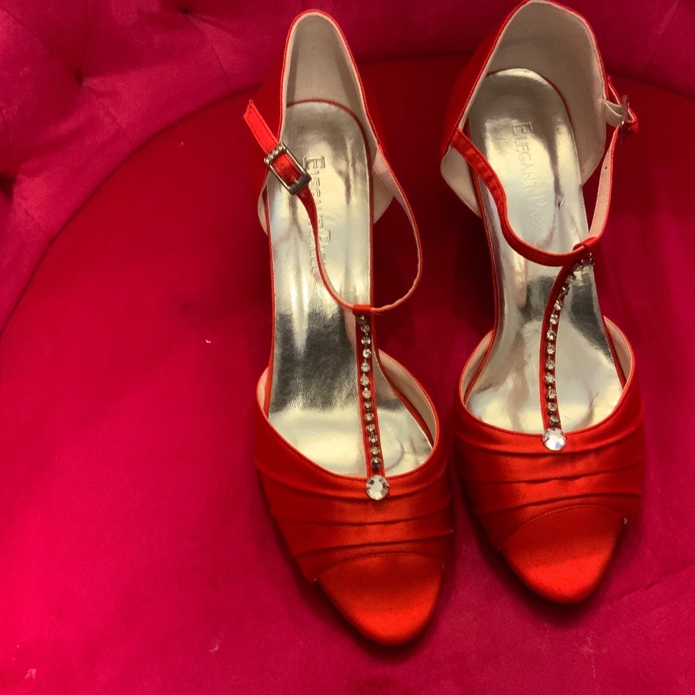 Pair of Elegant Park shoes red with rhinestones